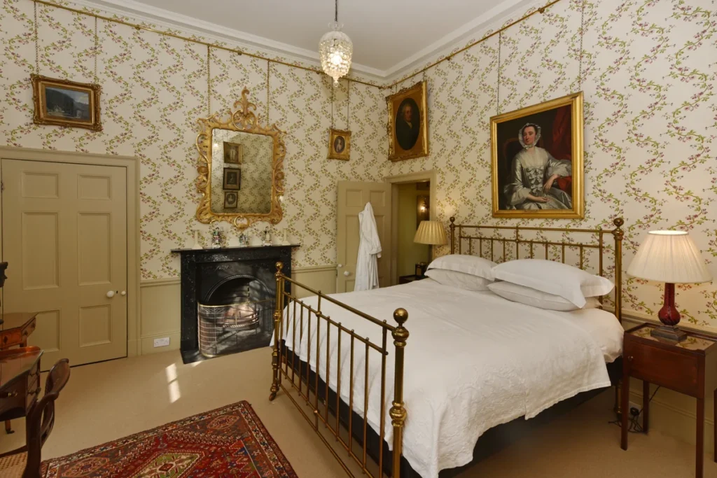 bedroom with golden wallpaper