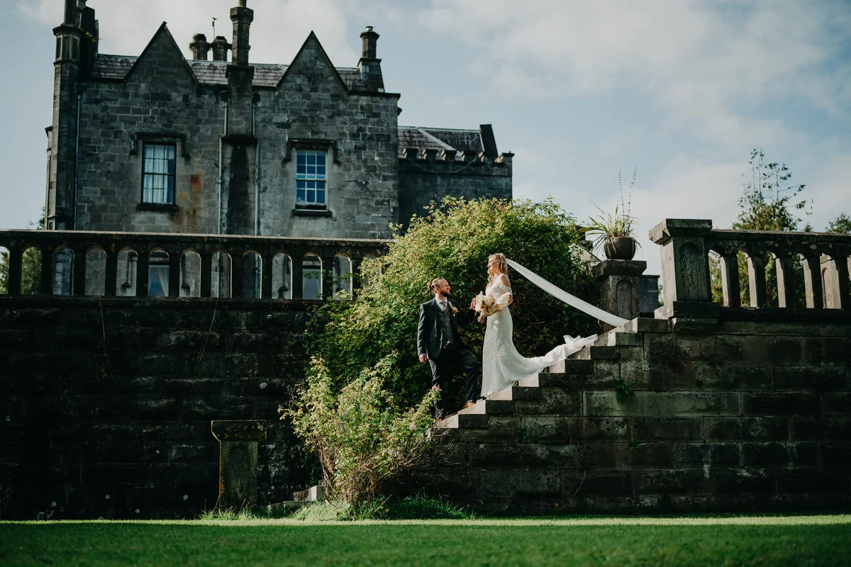couple standing on stairs