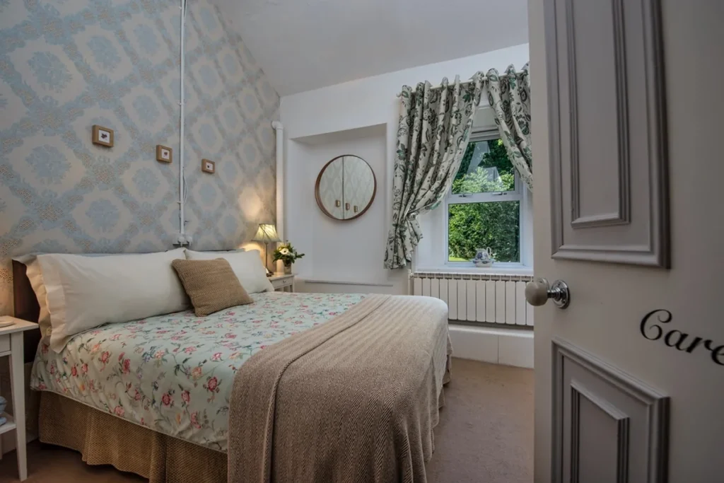 orlagh house bedroom with flower duvet