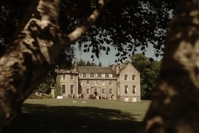raemoir house front view through trees